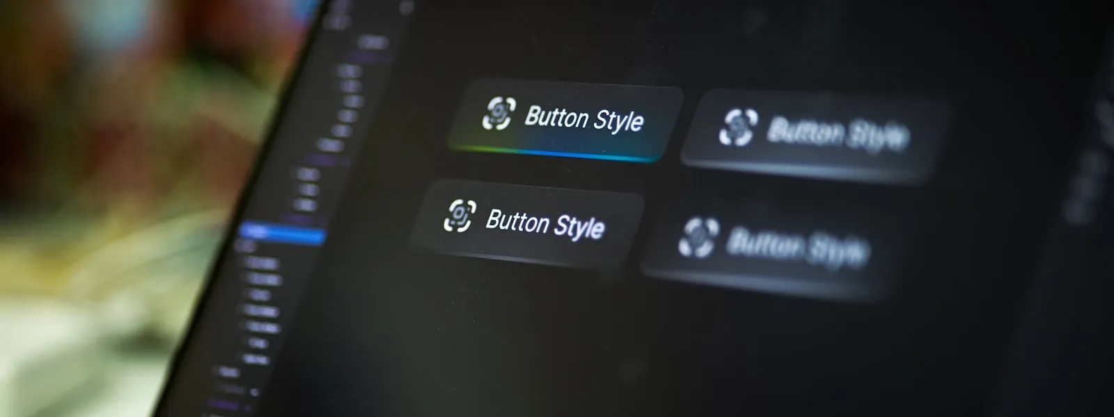 筆電螢幕上的 UI 按鈕樣式設計特寫，象徵從 Figma 設計稿生成程式碼