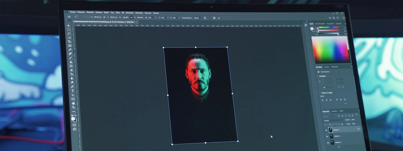 black lenovo laptop computer turned on displaying man in red shirt