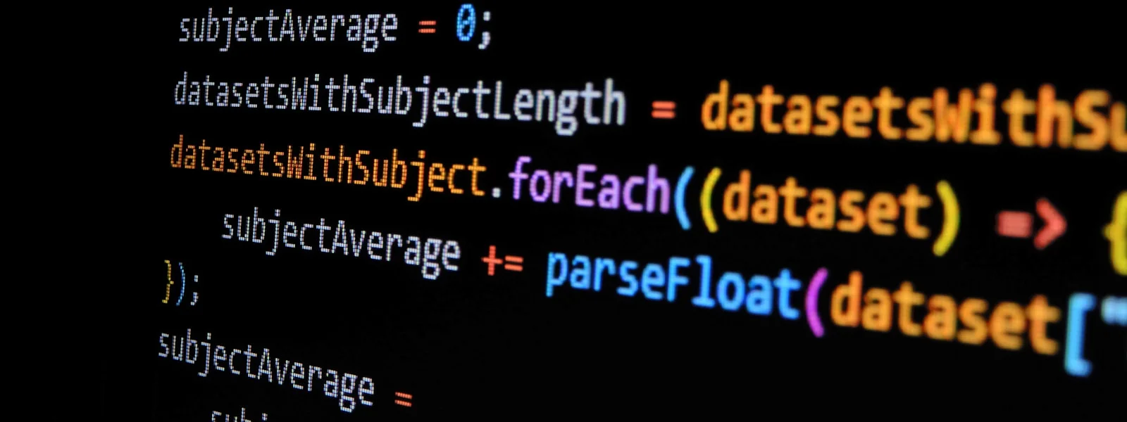 深色螢幕上顯示彩色語法高亮的 JavaScript 程式碼